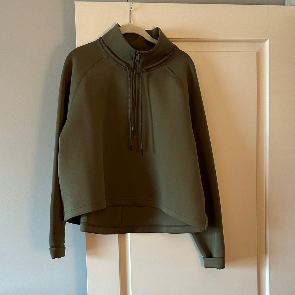 Olive Green Women's 1/2 zip. Little longer in the back. Never worn